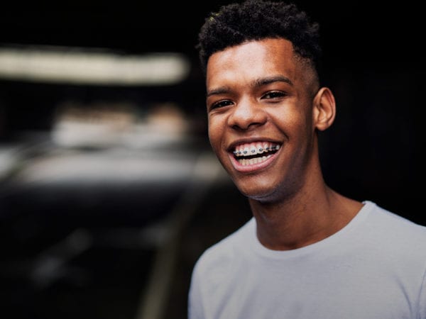 Teenage Boy with braces smiling