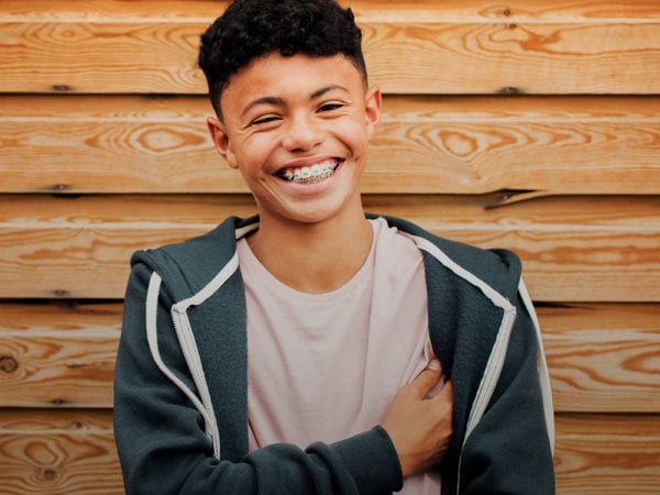 Young Boy smiling with Braces