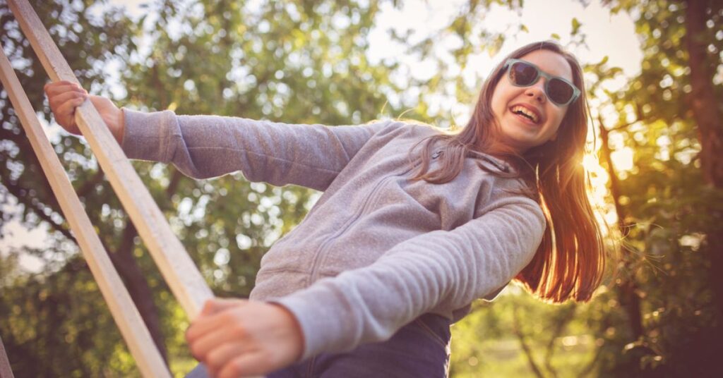 teen climbs ladder and learns myths about braces